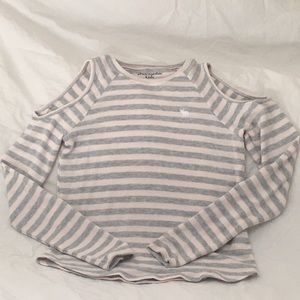 Sweater with cut out shoulders